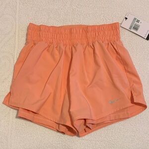 Women’s Nike dri fit peach running shorts! NWT